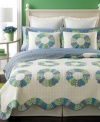 A classic design gets a modern makeover in this Rondelle quilt from Martha Stewart Collection, featuring traditional quilted details with fun, colorful printed accents. Finished with scalloped edges.