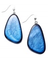 Seashore style. Style&co.'s breezy earring style looks like it was washed up onto the sand. Large plastic beads are lined with exotic blue shells and strung from fish wire. Set in silver tone mixed metal. Approximate drop: 1-5/8 inches.