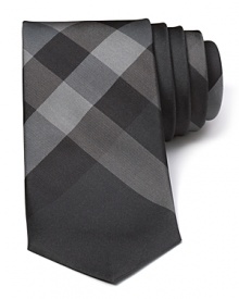 Crafted in luxe Italian silk, Burberry London's Rohan tie flaunts the classic check pattern in a narrower cut.