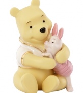 Something to hold on to, this Disney figurine depicts Winnie the Pooh and Piglet locked in a heartwarming bear hug. Featuring soft pastel tones and gold detail in Lenox porcelain.