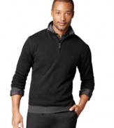 Stay solid. From jeans to dress pants, this Van Heusen sweater is the perfect layering piece.