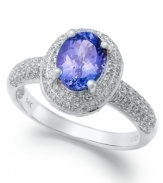 Add a colorful touch of shine. This pretty & polished ring highlights an oval-cut tanzanite (1-1/2 ct. t.w.) that stands out against rows of round-cut diamonds (1/2 ct. t.w.). Set in 14k white gold.