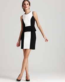 Black and white color blocking and a feminine peplum create an eye-catching look on this Cynthia Steffe dress--the definitive office to off-hours silhouette when style is the main event.