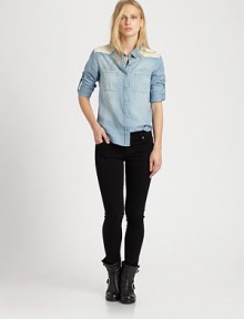 A modern take on the Western trend, this soft chambray shirt has contrasting leather panels and roll-tab sleeves. Point collarLeather-trim shouldersLong roll-tab sleevesButton frontLeather-trim patch pocketsLeather back panelBody: Cotton/linenTrim: LeatherDry clean with leather specialistImportedSIZE & FITModel shown is 5'9½ (176cm) wearing US size Small. 