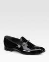 Black patent leather moccasin with silver finished horsebit detail.Leather soleMade in Italy