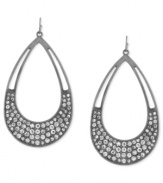 Shine at any occasion. Jessica Simpson's teardrop earrings, crafted from silver-tone mixed metal, are adorned with glistening crystal pave accents for a look that's truly radiant. Approximate drop: 2-3/4 inches.