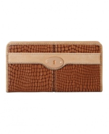 Slither your way to great style with this snakeskin print clutch wallet by Fossil. Accented with rose goldtone hardware and a signature plaque at front, this organized design is sure to spark some wallet-envy.