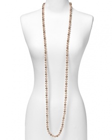 Carolee's jewels are in perfect step with fashion's love of statement baubles. Introduce a classic piece into your collection with this extra long pink pearl rope necklace, perfect for layering.