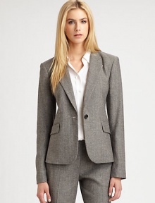 The impeccably-tailored blazer-the staple of any wardrobe-sleek and fitted for a modern silhouette.Notch collarLong sleevesChest pocketSingle button closureFlap pocketsVented back flapAbout 23 from shoulder to hem31% wool/26% viscose/25% cotton/10% polyester/6% polyamide/2% elastaneDry cleanMade in USA of Italian fabricModel shown is 5'10 (177cm) wearing US size 4.