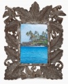 The eco-friendly and enchanting Forest picture frame surrounds images of your favorite people and places with lush and exotic Haitian foliage, all hand cut and hammered in recycled steel. Once the shaping and detail is complete, each is varnished and dried in the hot Caribbean sun.