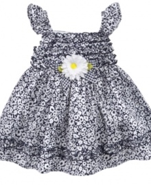 How adorable she is will be black and white in this appealing floral dress from Sweet Heart Rose.