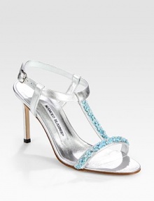 Metallic leather t-strap design encrusted in glimmering coral-shaped beads, secured by an adjustable ankle strap. Self-covered heel, 3 (75mm)Beaded metallic leather upperLeather lining and solePadded insoleMade in Italy