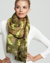 Earthy tones zig zag their way across this chic scarf from Theodora & Callum.