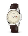 A diamante embossed face on a smooth leather strap lends Gucci's signature look to this versatile, timeless wristwatch.