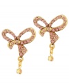 Feminine and fashionable. Ladylike bows adorn these sweet stud earrings from Betsey Johnson. Embellished with sparkling crystals in a pretty shade of pink, they're made in gold tone mixed metal. Approximate diameter: 1-1/10 inches.