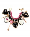 True love. An array of hearts and arrows comprise this chic charm bracelet from Betsey Johnson. Embellished with glass pearls, sparkling crystals and glitter, it's crafted in antique gold tone mixed metal and includes a toggle closure. Approximate length: 7-1/2 inches.