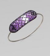 A bold, yet sleek style with a unique lattice pattern over glossy, colored glass. GlassSilverDiameter, about 2.5Hidden closureMade in Italy