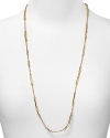 Whether worn with a party frock or everyday denim, this gold-tone bead and chain necklace from kate spade new york ups the elegance factor.