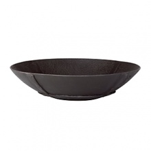 Handcrafted in India, this low profile, matte black metal bowl combines a primitive rustic look with all the benefits of modern design. Functioning elegantly as a decorative piece, it can also be used to feature certain foods.