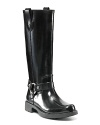 Slip-on rainboots with a motorcycle chic look. Decorative belted harness accents ankle. Pull tabs at top for easy on and off. 1.25 rubber heel. Fabric lining and rubber tread sole.