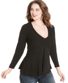 Score some the season's hottest trends with American's Rag's striped plus size top, punctuated by a peplum waist.