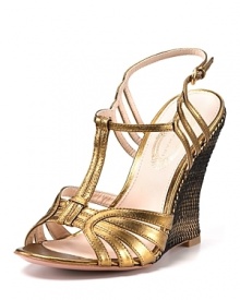 A gleaming design from Elie Tahari, given an earthy balance with the addition of a printed straw wedge.