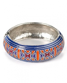 Tap into the tribal accessories trend with Aqua's patterned enamel bangle. This wrist piece pair boasts far flung appeal, so it give day-to-day looks exotic glamour.