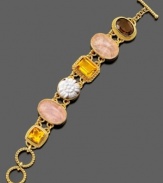 A colorful bracelet with a touch of antique style featuring smokey quartz (11 ct. t.w.), rose quartz (17x25 mm), white agate (18 mm) and golden citrine (13-1/4 ct. t.w.) set in 14k gold over sterling silver. Approximate length: 7-1/4 inches.