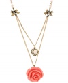 Petal perfection. A radiant rose adorns this pretty double-row pendant necklace from Betsey Johnson. Embellished with a clear faceted heart charm, bows and cherry beads, it's crafted in antique gold tone mixed metal. Approximate length: 16 inches + 3-inch extender. Approximate drop: 1 inch.