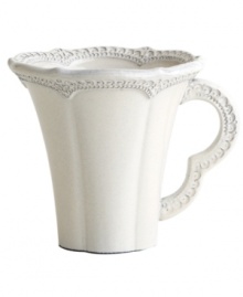 Handcrafted in the Italian tradition, the Merletto mug is intricately embellished with a lacy floral texture and painted a creamy antique white. An elegant companion to Arte Italica dinnerware.