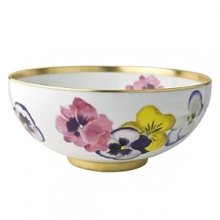 Pensees large bowls by Bernardaud. This lively, luxurious collection is sure to transform your table into a celebration of spring. The floral watercolor pattern features delicate, multicolored pansies that appear to be strewn across the surface of each piece.