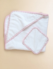 The perfect set for baby's first bath, in snuggly cotton terry edged in floral vine trim.Includes towel and washclothMachine washCottonImported