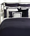 Featuring a tone-on-tone woven jacquard pattern finished with a 2 flange, the Glen Plaid sham from Lauren Ralph Lauren is simply sophisticated. Also features 300 thread count cotton with side button closure and signature shell buttons.