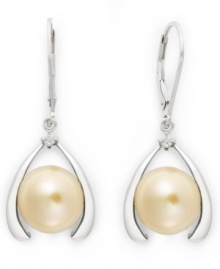 Good luck and a touch of polish. These sophisticated horseshoe-shaped earrings feature a cultured golden South Sea pearl (10-12 mm) and sparkling diamond accents. Earrings secure with a sterling silver lever backing. Approximate drop: 1 inch.