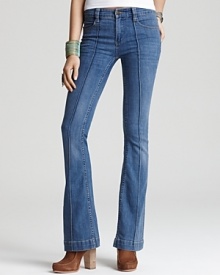 Harken back to the '70s in Free People flare-leg jeans, featuring seams through the front legs and detailed back patch pockets. Platforms punctuate with authenticity, but you add all the style.