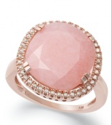 Blushworthy hues. This stunning statement ring features a round, faceted pink opal (4-3/4 ct. t.w.) that pops against a sparkling diamond frame (1/5 ct. t.w.). Set in 14k rose gold over sterling silver. Size 7.