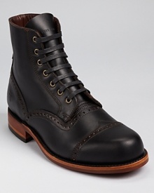 The classic Frye boot, a bold cap toe affair with perforated wingtip accents and a tough leather and rubber outsole