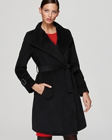 An essential for smart, sophisticated style, this Bloomingdale's exclusive Gerard Darel coat flaunts a classic silhouette and chic belt for a flattering, feminine fit.