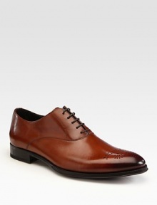 Hand burnished, medallion toe lace-up designed in Italian leather is sure to be a wardrobe staple.Leather upperLeather liningPadded insoleLeather soleMade in Italy