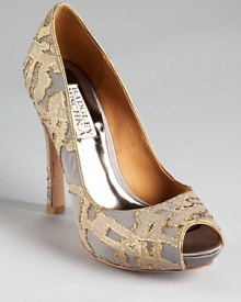 In patterned, metallic silk, Badgley Mischka's dressed up Roxie pumps showcase a luxe look.