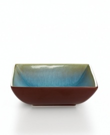 Earthy hues of amber, sienna and jade become otherworldly with reactive glaze. This intense color, coupled with a sharp square shape, produces a vegetable bowl with stunning beauty and contemporary flair.  From The Cellar's collection of dinnerware and dishes.