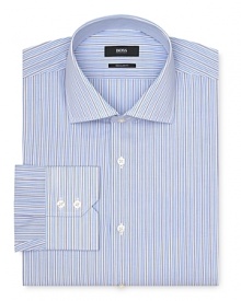 Boasting a handsome, traditional stripe pattern, this regular fit dress shirt pairs well with an assortment of tie styles for a dapper, professional look.