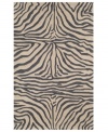 Venture outdoors with this chic area rug, displaying a classic zebra-print design. Hand-hooked of a durable polypropylene-acrylic blend, the Promenade rug can go virtually anywhere! Give some life to your outdoor patio or add some intrigue to your fashion-forward family room.