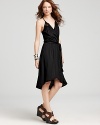 A little bit of drama becomes you with this strappy Ella Moss wrap dress.