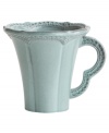 Handcrafted in the Italian tradition, the Merletto mug is intricately embellished with a lacy floral texture and painted a serene aqua hue. An elegant companion to Arte Italica dinnerware.