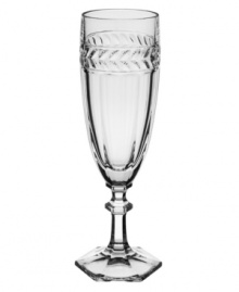 Regal shaping blends with romantic accents in this storybook stemware pattern from Villeroy & Boch. Ornate cut crystal stems support fluted bowls crowned by a fern leaf band.