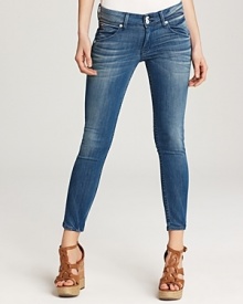 A subtly cropped silhouette makes these artfully faded Hudson skinny jeans the perfect pair for balmy-season style.