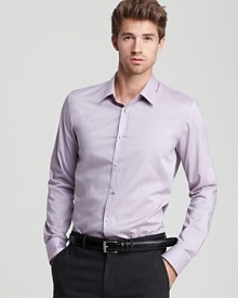 Pure sophistication. The slim fit sport shirt with a clean placket in crisp cotton.