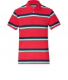 Must-have for the coming season is the classic polo shirt - This  version, from Ralph Lauren, the master of American style, features cool stripes in fine cotton, with embroidered signature logo on chest - Slim cut is longer in back than front - Try with favorite jeans, chinos or shorts for perfect preppy style