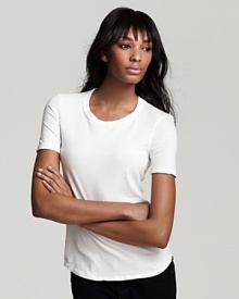 Get back to basics is this James Perse fitted white tee. The super soft crew neck shirt is a must-have staple for every woman's wardrobe.